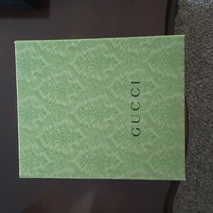 Gucci Collapsible box.